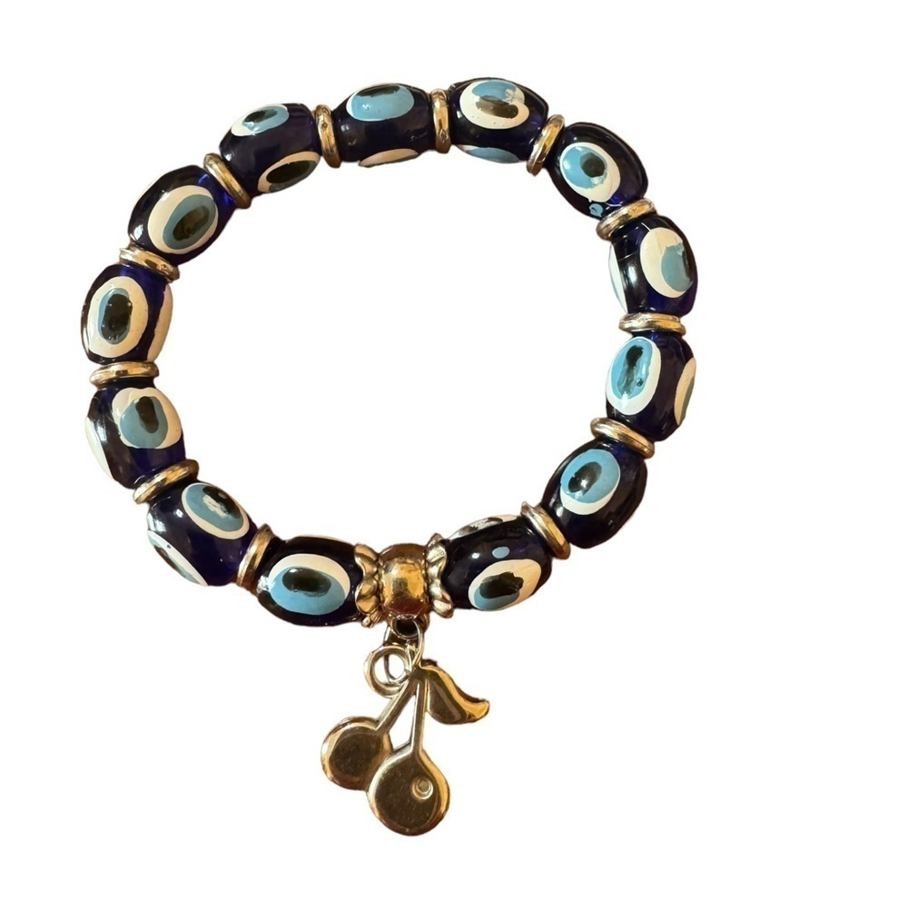 Mystical Charm Evil Eye Stretch Bracelet With Dangling Silver-Tone Cherry Charm
